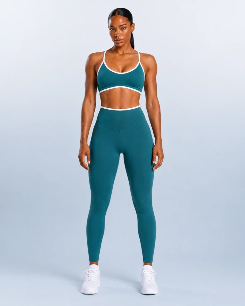 Seamless contrast-trim bra and full-length leggings set in teal